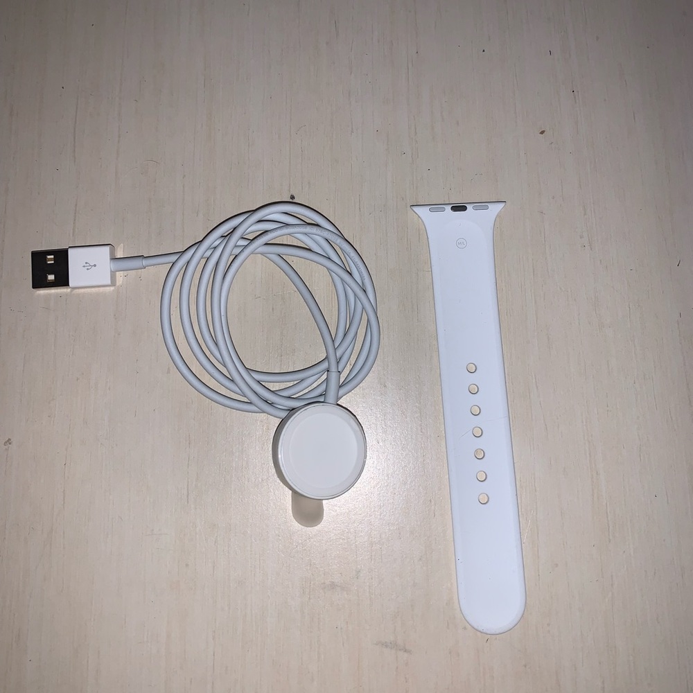 Apple Watch charger and M/L band white sports band